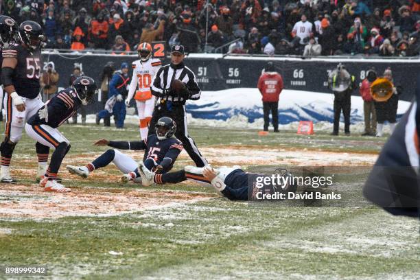 Mitchell Trubisky of the Chicago Bears celebrates his touchdown against the Cleveland Browns during the fourth quarter with Josh Bellamy and Kendall...