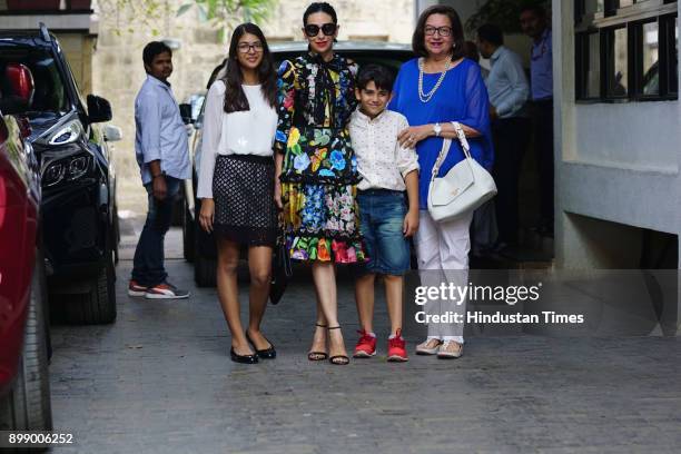 Bollywood actor Karisma Kapoor with her kids, son Kiaan and daughter Samaira attended Christmas party at Kunal Kapoor's Juhu residence on December...