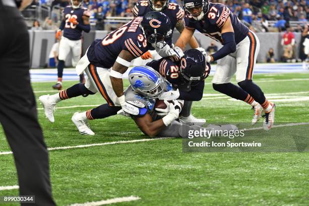 Detroit Lions RB Theo Riddick gets tackled by Chicago Bears CB Prince Amukamara in the NFL game between Chicago Bears and Detroit Lions on December...