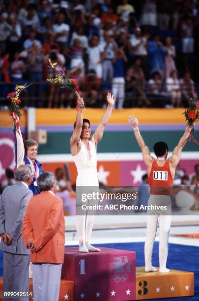 Los Angeles, CA Peter Vidmar, Koji Gushiken, Li Ning, Men's Gymnastics medal ceremony, Pauley Pavilion, at the 1984 Summer Olympics, July 31, 1984.