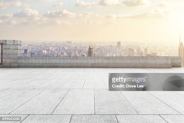 urban square - skyscraper roof stock pictures, royalty-free photos & images