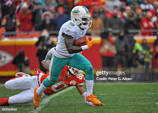 Wide receiver Jakeem Grant of the Miami Dolphins returns a kickoff against the Kansas City Chiefs during the first half of the game at Arrowhead...