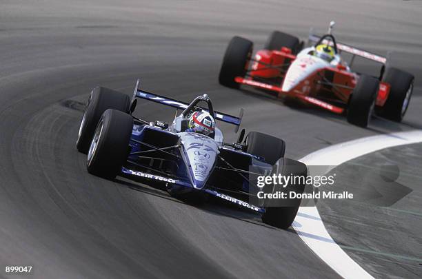 Dario Franchitti drives his Team Kool Green Honda Lola during the Grand Prix of Chicago round 7 of the CART FedEx Championship Series on June 30,...