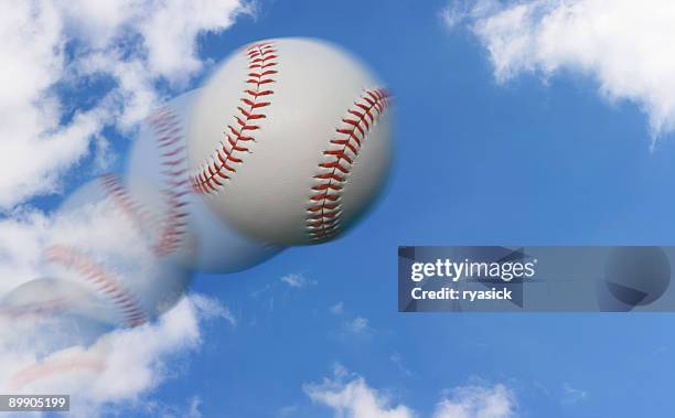 multiple exposure of a baseball flying through the sky - baseball trajectory stock pictures, royalty-free photos & images