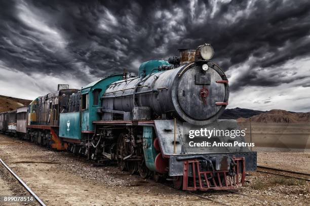 locomotive train in wadi rum desert, jordan - steam train stock pictures, royalty-free photos & images