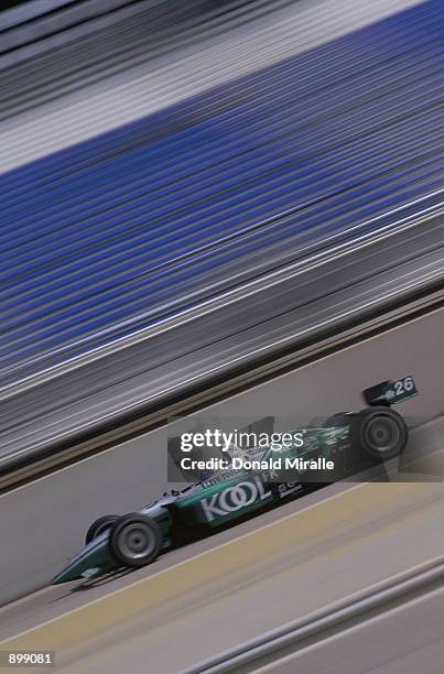 Paul Tracy drives his Team Kool Green Honda Lola during the Grand Prix of Chicago round 7 of the CART FedEx Championship Series on June 30, 2002 at...