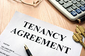 Tenancy agreement and keys from home.