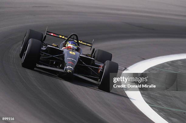 Cristiano da Matta drives his Newman Haas Racing Toyota Lola during the Grand Prix of Chicago round 7 of the CART FedEx Championship Series on June...