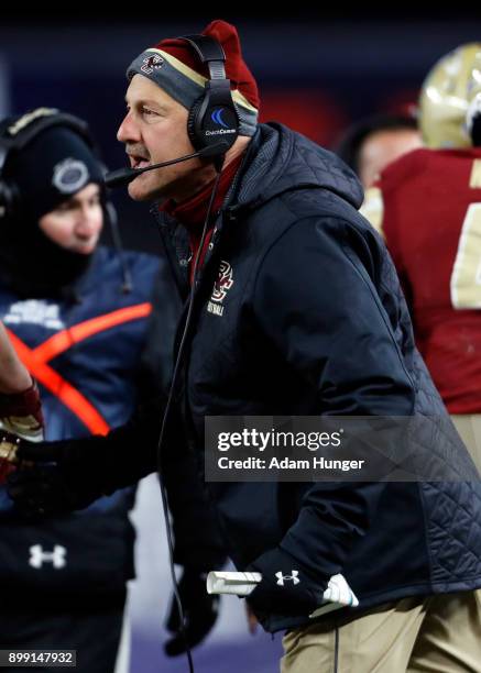 Head coach Steve Addazio of the Boston College Eagles directs his team against the Iowa Hawkeyes during the first half of the New Era Pinstripe Bowl...