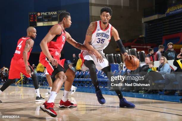 Christian Wood of the Delaware 87ers handles the ball against Bruno Caboclo of the 905 Raptors during a G-League at the Bob Carpenter Center in...