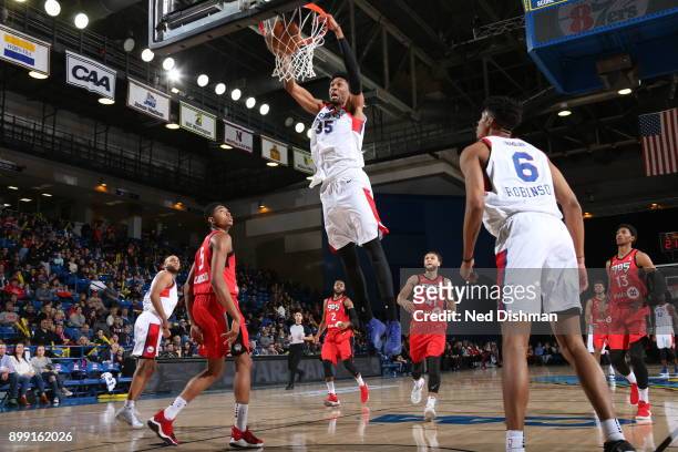 Christian Wood of the Delaware 87ers dunks the ball against the 905 Raptors during a G-League at the Bob Carpenter Center in Newark, Delaware on...