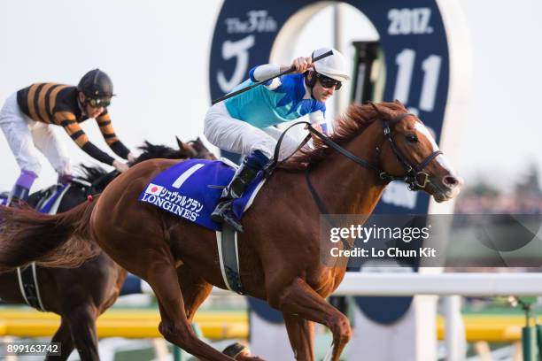 Jockey Hugh Bowman riding Cheval Grand wins the Japan Cup in association with Longines at Tokyo Racecourse on November 26, 2017 in Tokyo, Japan.