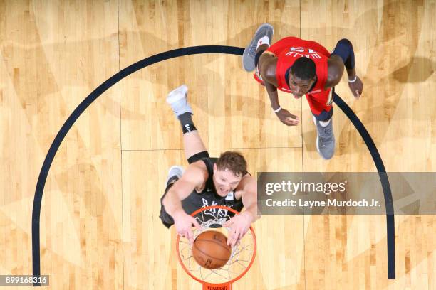 Timofey Mozgov of the Brooklyn Nets dunks the ball against the New Orleans Pelicans on December 27, 2017 at Smoothie King Center in New Orleans,...