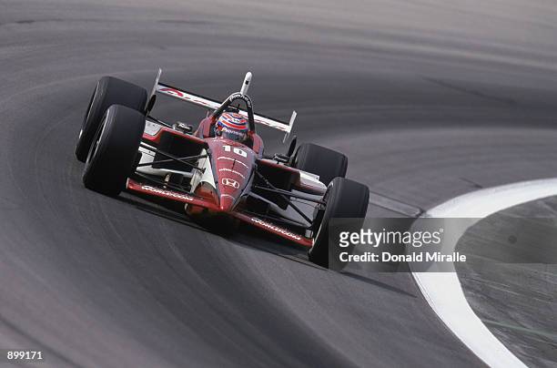 Tony Kanaan drives his Mo Nunn Racing Honda Reynard during the Grand Prix of Chicago round 7 of the CART FedEx Championship Series on June 30, 2002...