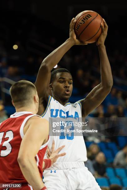 Bruins guard Kris Wilkes changes direction during the game between the South Dakota Coyotes and the UCLA Bruins on December 19 at Pauley Pavilion in...