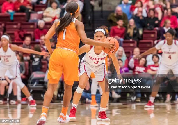 Stanford Cardinal guard Anna Wilson watches as Tennessee Lady Volunteers guard Anastasia Hayes sets up a play during the game between the Tennessee...