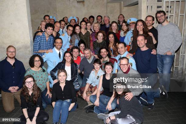 Hillary Rodham Clinton, Bill Clinton, Chelsea Clinton Mezvinsky and Marc Mezvinsky pose with the cast and crew backstage at the hit musical "The...