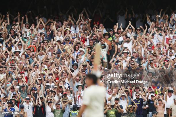 Alastair Cook of England celebrates making his double century in front of the Barmy Army during day three of the Fourth Test Match in the 2017/18...