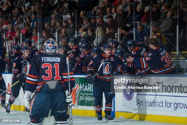 Joe Gatenby skates past the bench toward Dylan Ferguson of the Kamloops Blazers after scoring the third period tying goal at 18:42 against the...