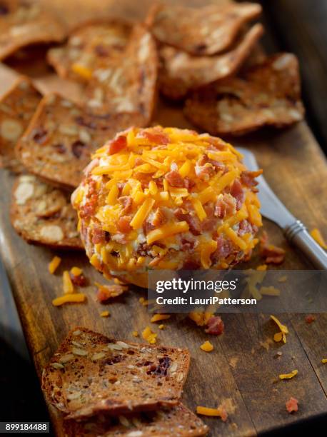 bacon and cheddar cheese ball with crackers - cheese ball stock pictures, royalty-free photos & images