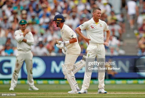 Bowler Jackson Bird of Australia looks on as Alastair Cook and Stuart Broad of England run between the wickets during day three of the Fourth Test...