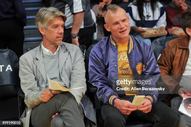 Screenwriter Stephen Gaghan and musician Flea attend a basketball game between the Los Angeles Lakers and the Memphis Grizzlies at Staples Center on...