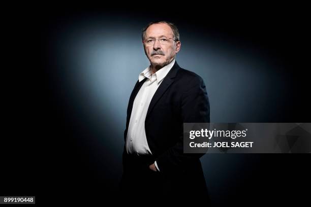 French Rugby Union national team coach Jacques Brunel poses during a photo session in Paris, on December 27, 2017. Guy Noves was sacked on December...