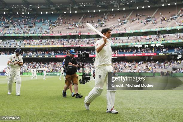 Alastair Cook of England walks off at the close of play after making 244 not out during day three of the Fourth Test Match in the 2017/18 Ashes...