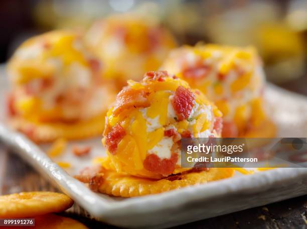 bite size bacon and cheddar cheese ball with crackers - cheese ball stock pictures, royalty-free photos & images