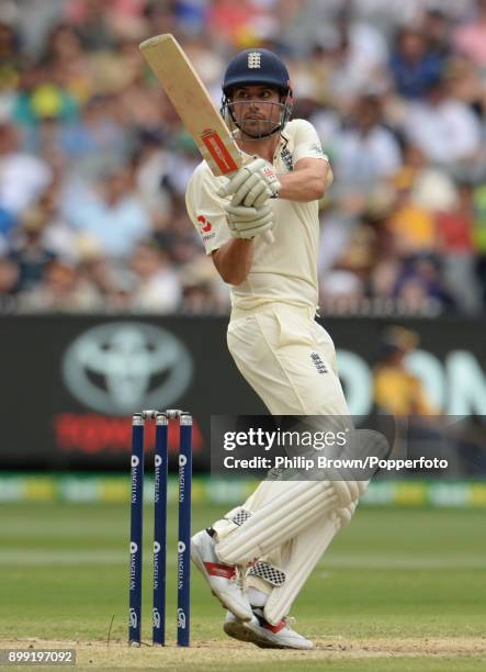 Alastair Cook hits out during the third day of the fourth Ashes cricket test match between Australia and England at the Melbourne Cricket Ground on...