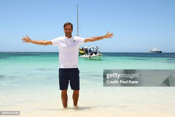 Roger Federer of Switzerland poses on the beach for media at Rottnest Island ahead of the 2018 Hopman Cup on December 28, 2017 in Perth, Australia.