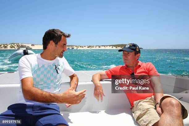 Roger Federer of Switzerland talks with Western Australian Premier Mark McGowan at Rottnest Island ahead of the 2018 Hopman Cup on December 28, 2017...