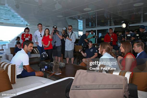 Roger Federer of Switzerland addresses the media on board Anya at Rottnest Island ahead of the 2018 Hopman Cup on December 28, 2017 in Perth,...