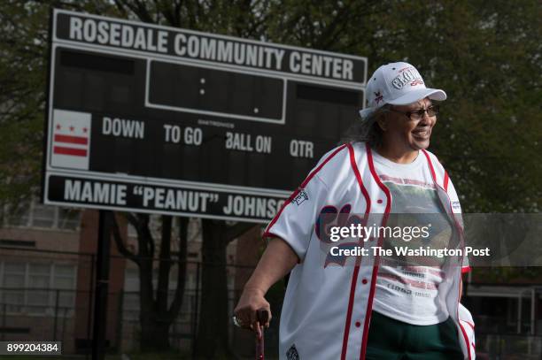 Mamie "Peanut" Johnson, the first woman player in the Negro baseball league, who pitched for the Indianapolis Clowns, poses at the new ball field...