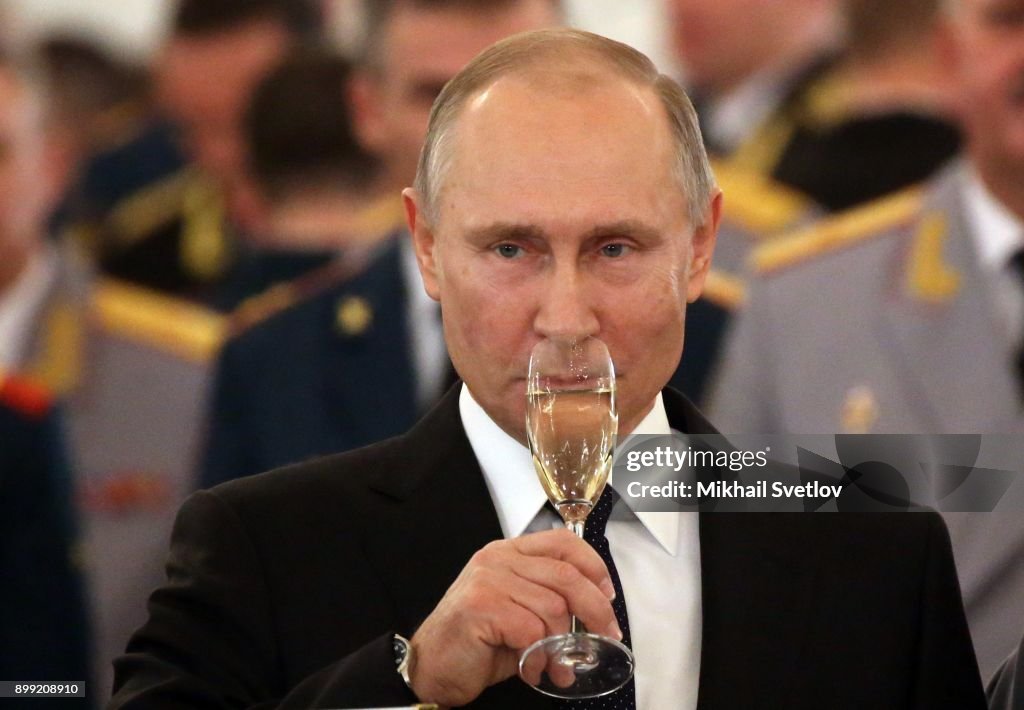 Russian President Vladimir Putin attends a reception for military servicemen who took part in Syrian campaign