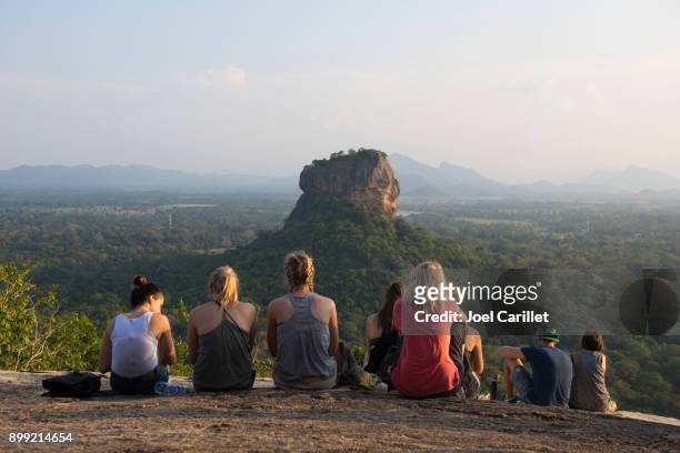 young travelers at pidurangala rock, sigiriya, sri lanka - sigiriya stock pictures, royalty-free photos & images
