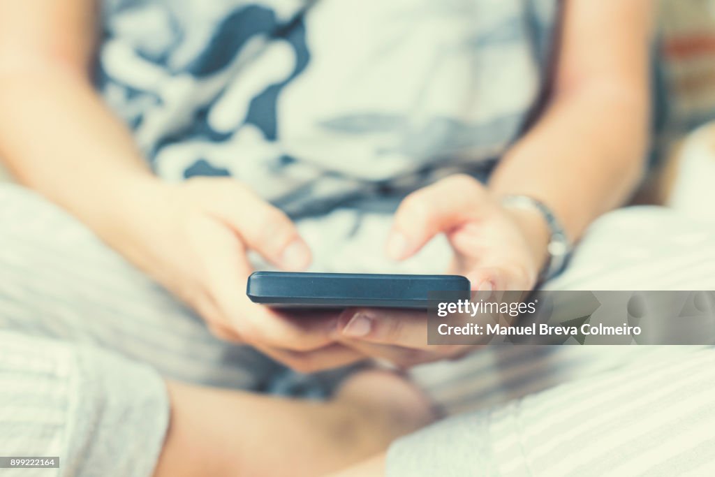 Teenage girl using a smart phone