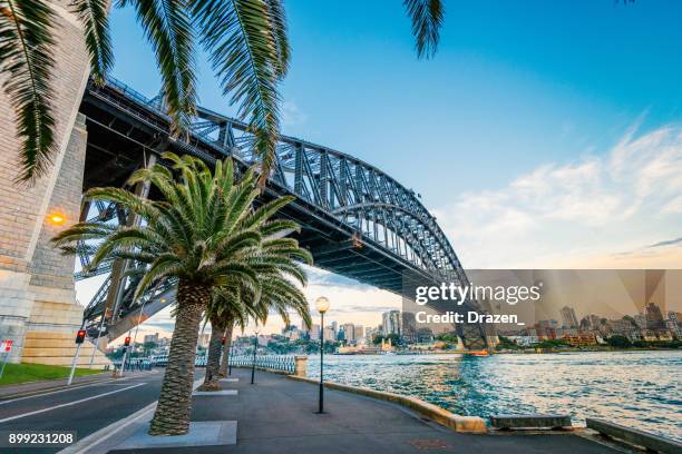 famous travel destination for many travelers is sydney, australia - sydney at dusk stock pictures, royalty-free photos & images