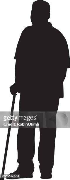 man standing with cane silhouette - old silhouette man stock illustrations