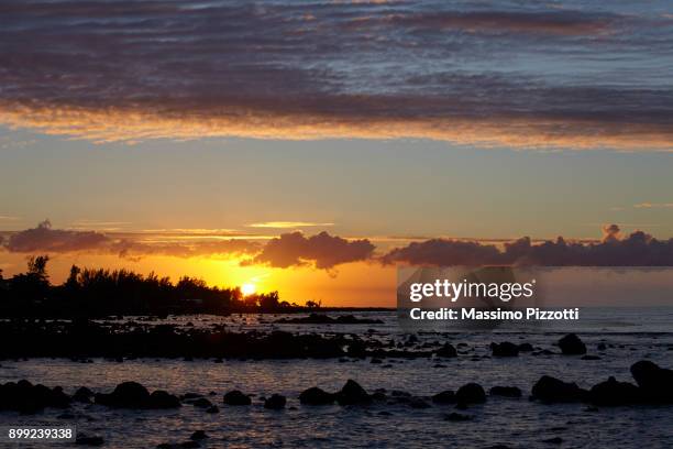 sunset at grand bay, mauritius - massimo pizzotti - fotografias e filmes do acervo