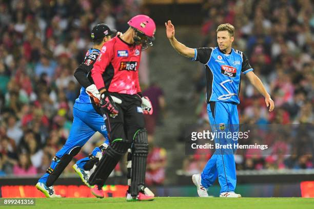 Ben Laughlin of the Strikers celebrates taking the wicket of Johan Botha of the Sixers during the Big Bash League match between the Sydney Sixers and...