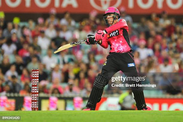 Johan Botha of the Sixers bats during the Big Bash League match between the Sydney Sixers and the Adelaide Strikers at Sydney Cricket Ground on...