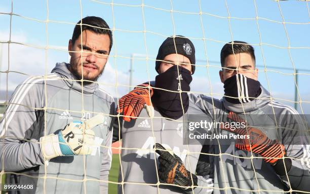 Sergio Romero, David de Gea and Joel Pereira of Manchester United in action during a first team training session at Aon Training Complex on December...