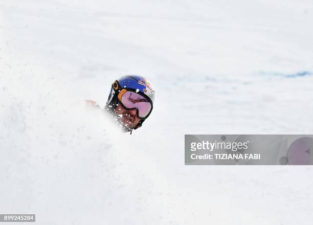 Norway's Aksel Lund Svindal celebrates after crossing the finish line of the FIS Alpine World Cup Men Downhill in Bormio, Italian Alps on December...