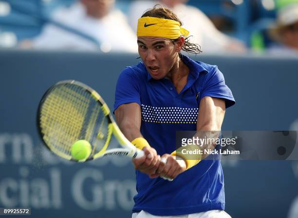 Rafael Nadal of Spain hits a backhand against Andreas Seppi of Italy during day three of the Western & Southern Financial Group Masters on August 19,...