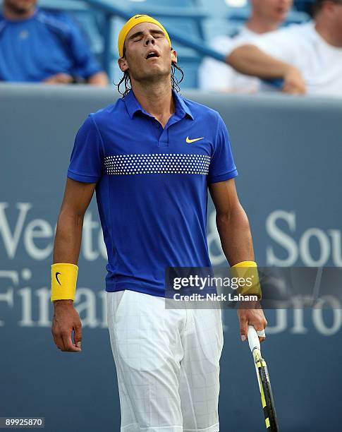 Rafael Nadal of Spain reacts to a missed shot against Andreas Seppi of Italy during day three of the Western & Southern Financial Group Masters on...