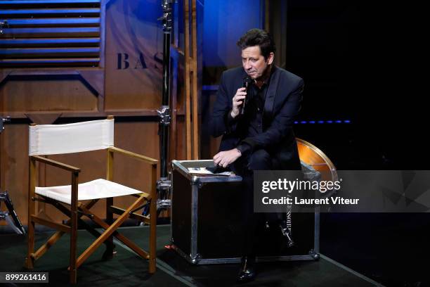 Laurent Gerra imitates TV Presenter Laurent Delahousse during "Laurent Gerra Sans Moderation" at L'Olympia on December 27, 2017 in Paris, France.