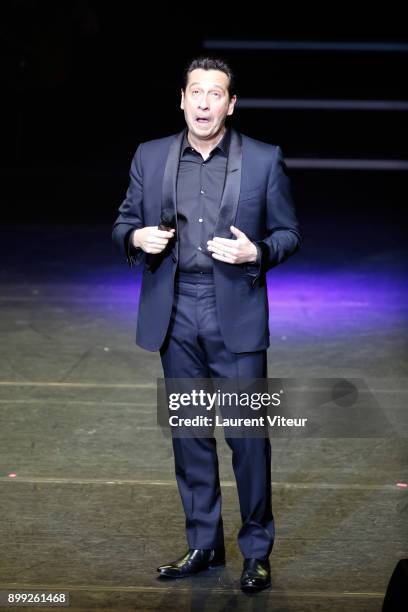 Laurent Gerra imitates Singer Celine Dion during "Laurent Gerra Sans Moderation" at L'Olympia on December 27, 2017 in Paris, France.