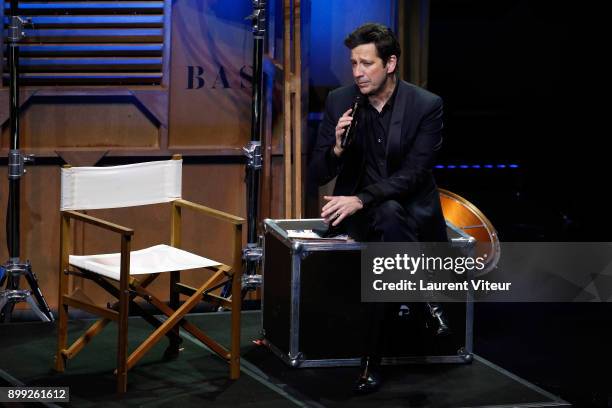 Laurent Gerra imitates TV Presenter Laurent Delahousse during "Laurent Gerra Sans Moderation" at L'Olympia on December 27, 2017 in Paris, France.