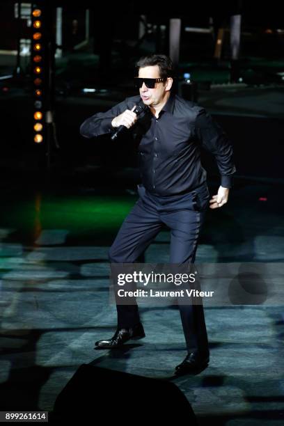 Laurent Gerra imitates Singer Maitre Gims during "Laurent Gerra Sans Moderation" at L'Olympia on December 27, 2017 in Paris, France.